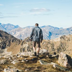 man-hiking-in-mountains